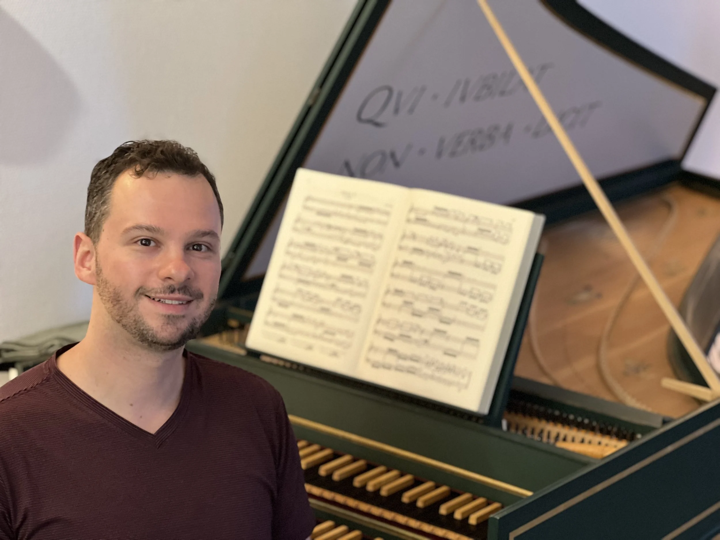 Noah Jaffe at a harpsichord